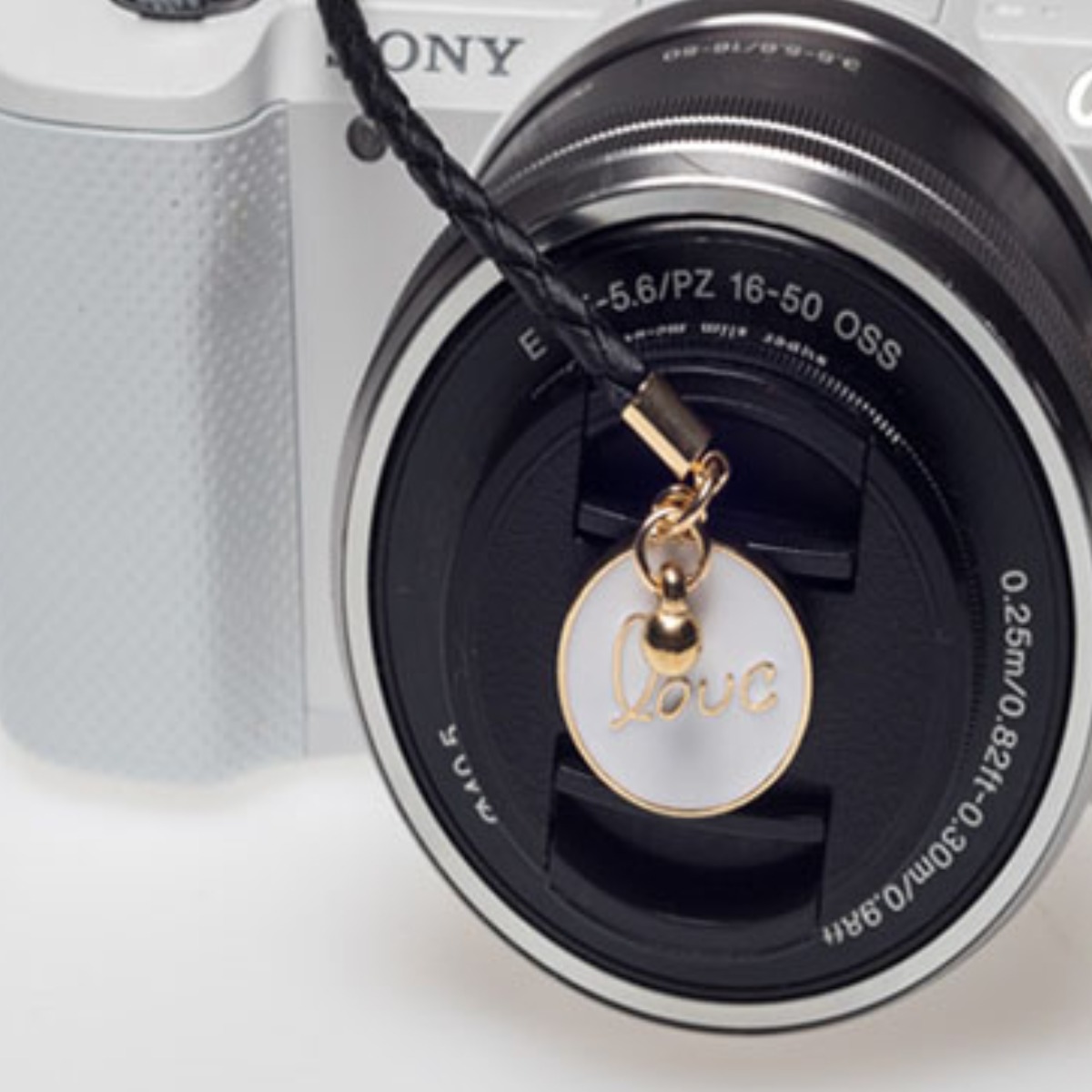 이너스 카메라 렌즈캡 분실방지 액세서리 - 러브러브, 22cm-블랙, 1개 4,000원