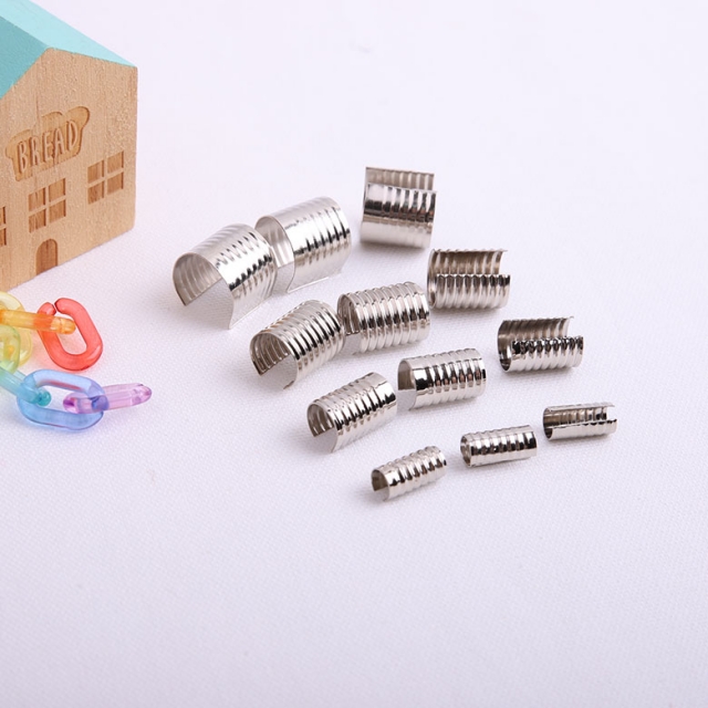 쏘잉갤러리 원통형 고정클립 마감캡 후드끈 마감끝쇠 마감팁, 10*13mm/100개, 1개 12,600원