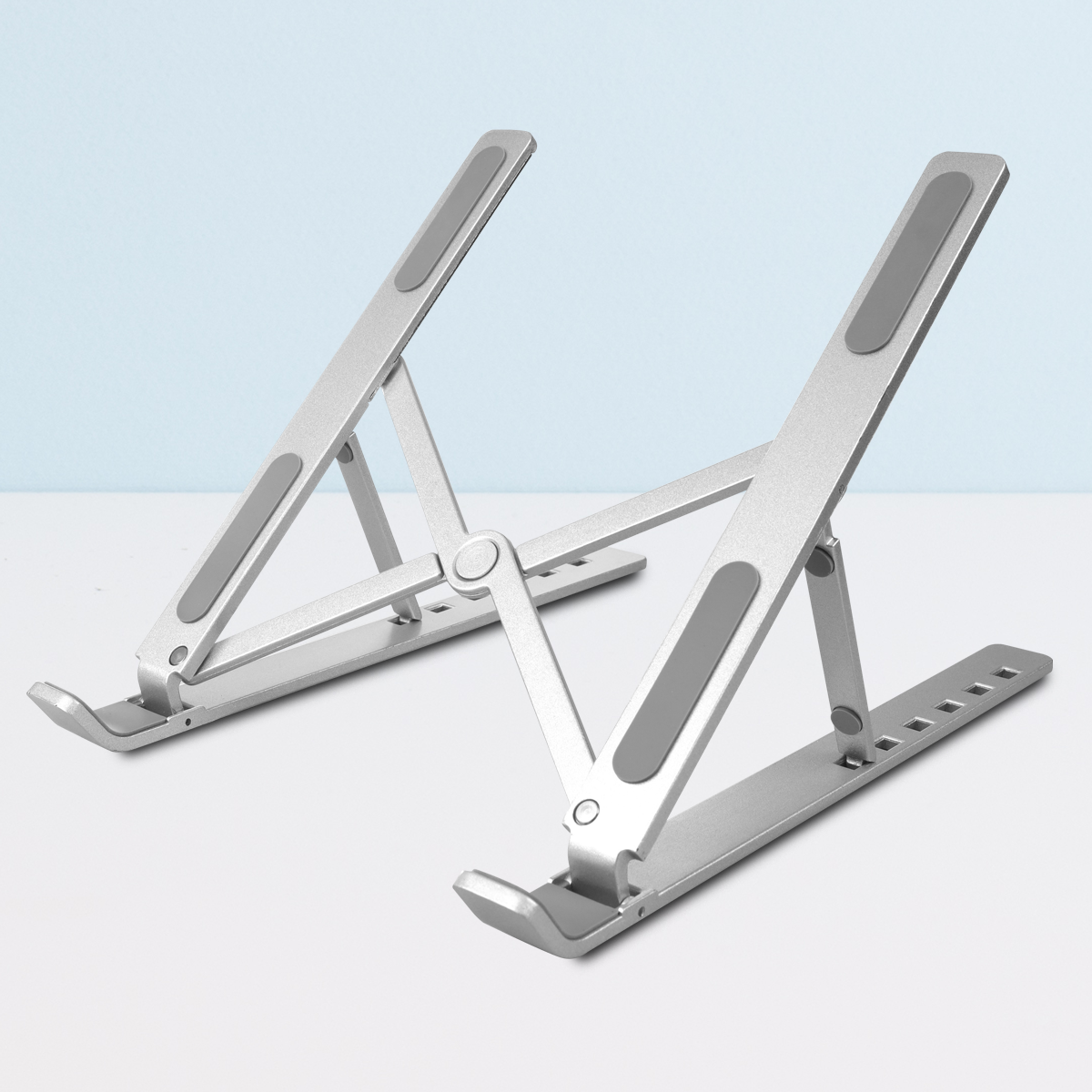 홈플래닛 접이식 휴대용 알루미늄 노트북 거치대 (휴대용 파우치 포함) 9,990원