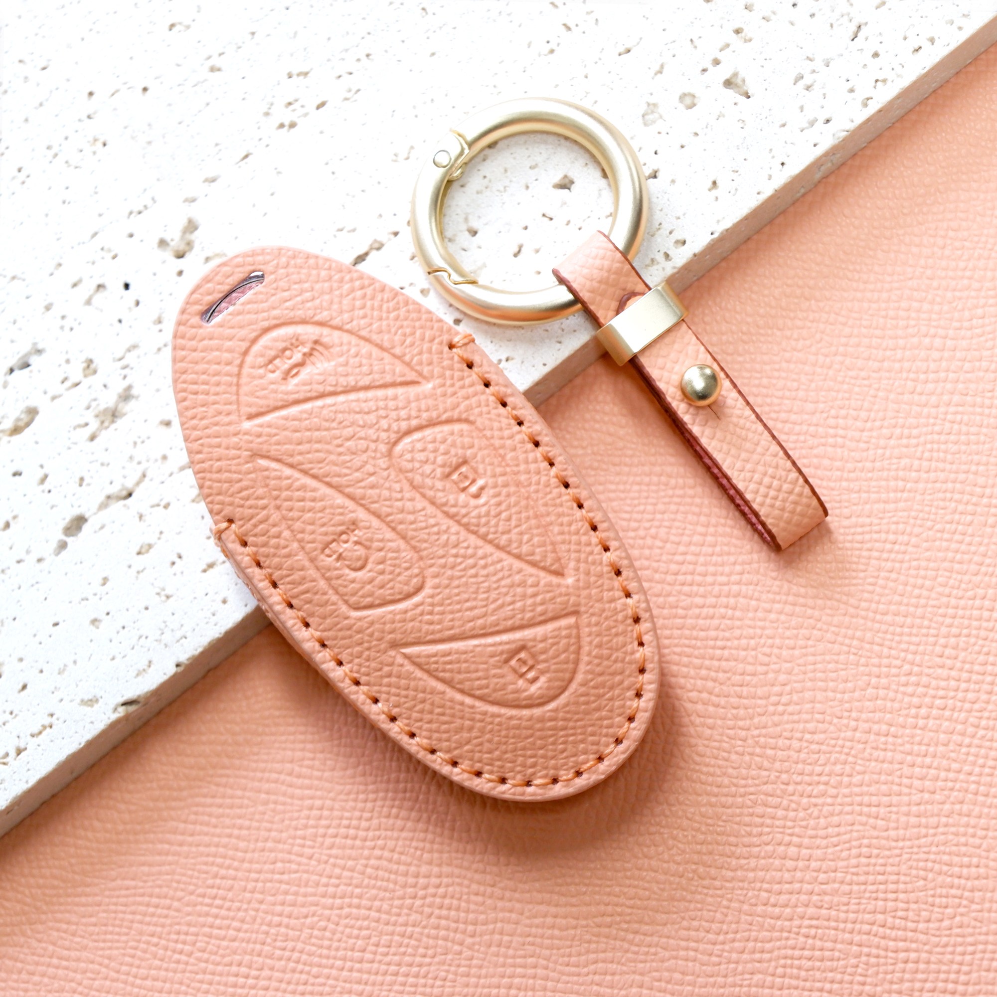 트니르 현대 호환 신형 5버튼 7버튼 디올 뉴 싼타페MX5 그랜저GN7 더뉴아반떼 쏘나타디엣지 더뉴투싼 코나 아이오닉 조약돌 차 키케이스 소가죽 + 키링 차량용품 키홀더 19,990원