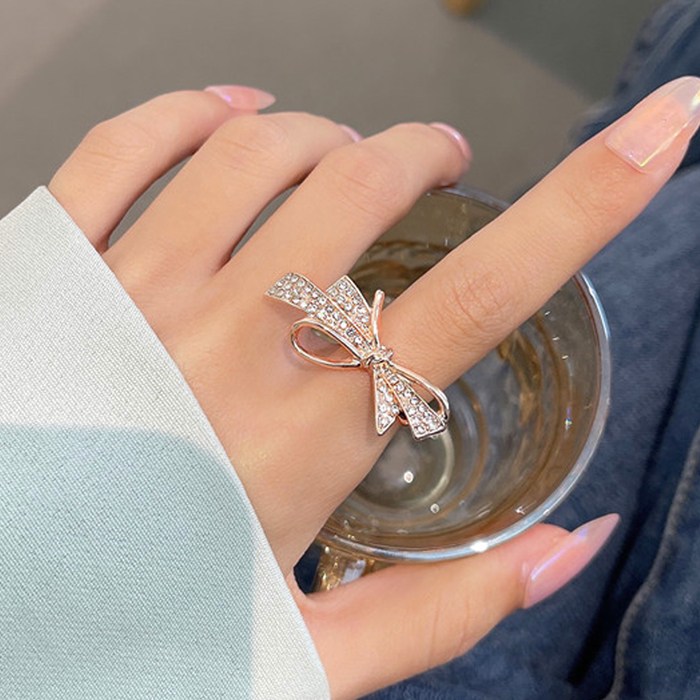 ZR103b 화려한 큐빅 가득 리본 반지 포인트 블링 반짝 러블리 여성 패션 주얼리 13,900원