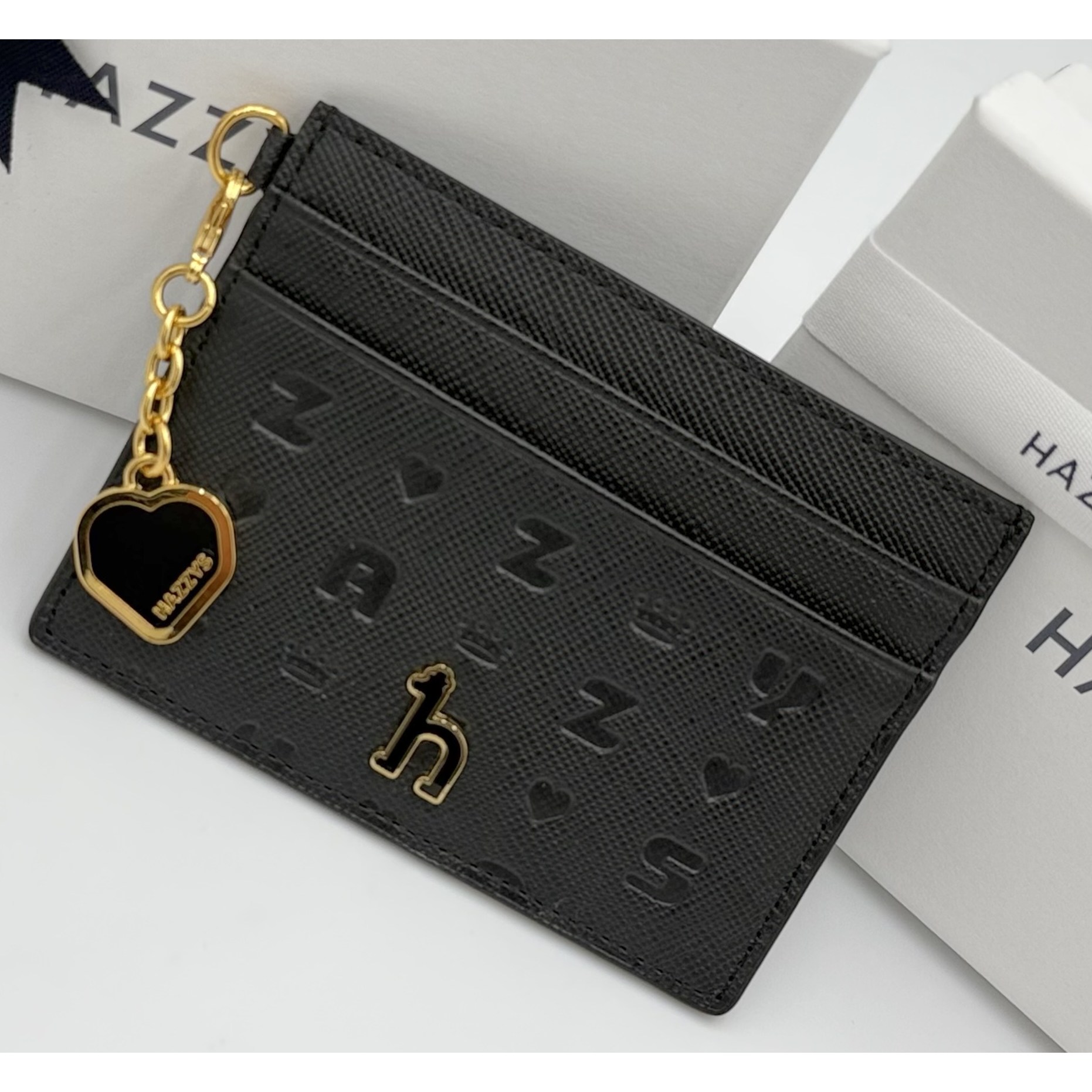 헤지스 로고 하트장식 여성 일상용 소가죽 카드지갑 (선물포장) 62,870원