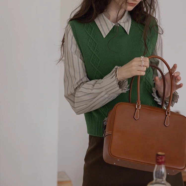 유니크한결 울 블렌드 니트조끼 29,800원