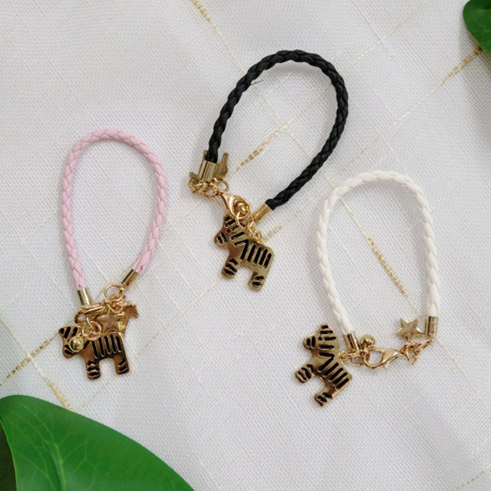 소니카메라/캐논카메라/렌즈캡홀더/캡홀더액세서리/카메라 캡홀더 분실방지 12cm - 얼룩말과흰색말 900원