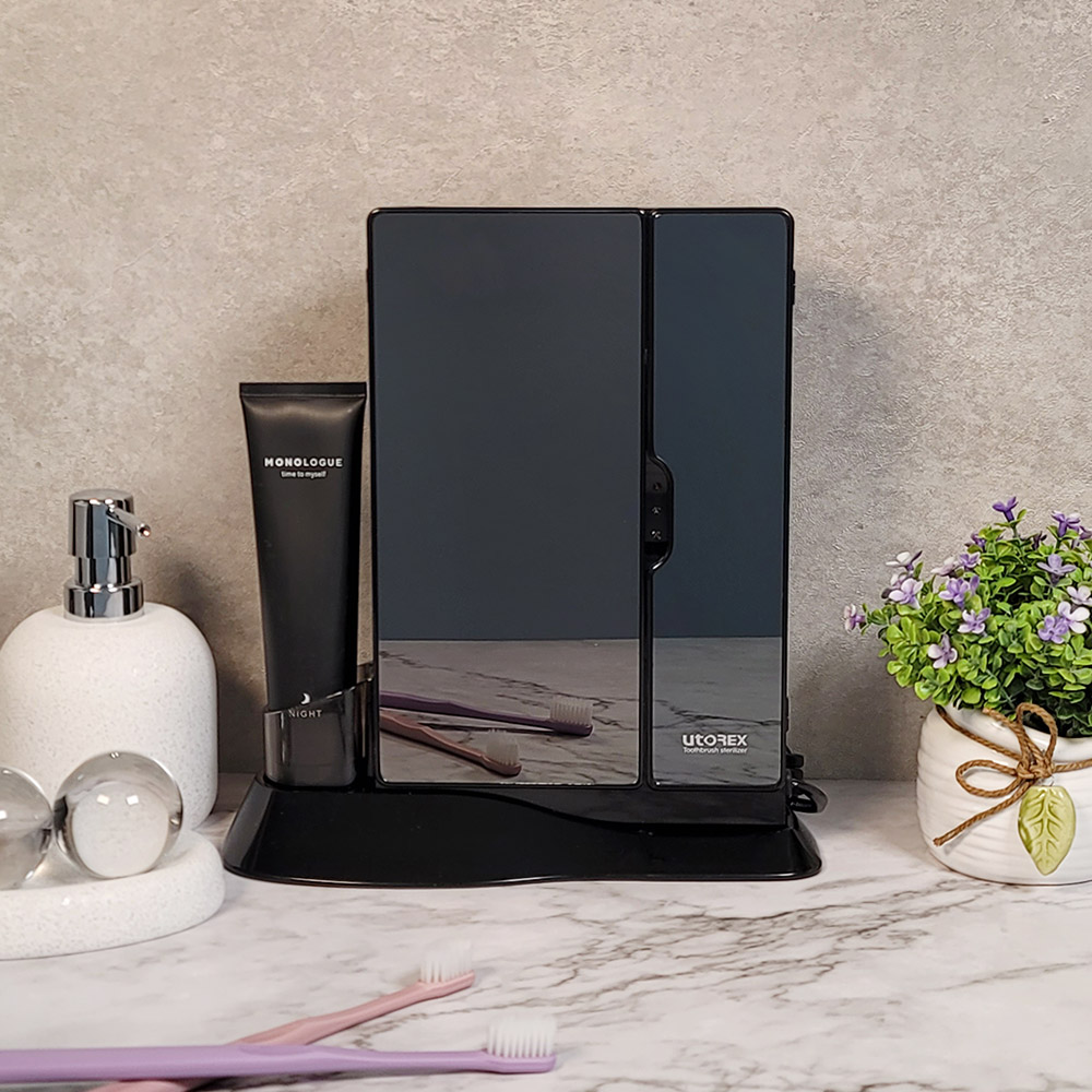 유토렉스 가정용 UV LED 살균 세라믹 히팅 건조기 소독 스탠드 벽걸이 블랙 미러 칫솔 살균기 UTC-83UV 48,900원