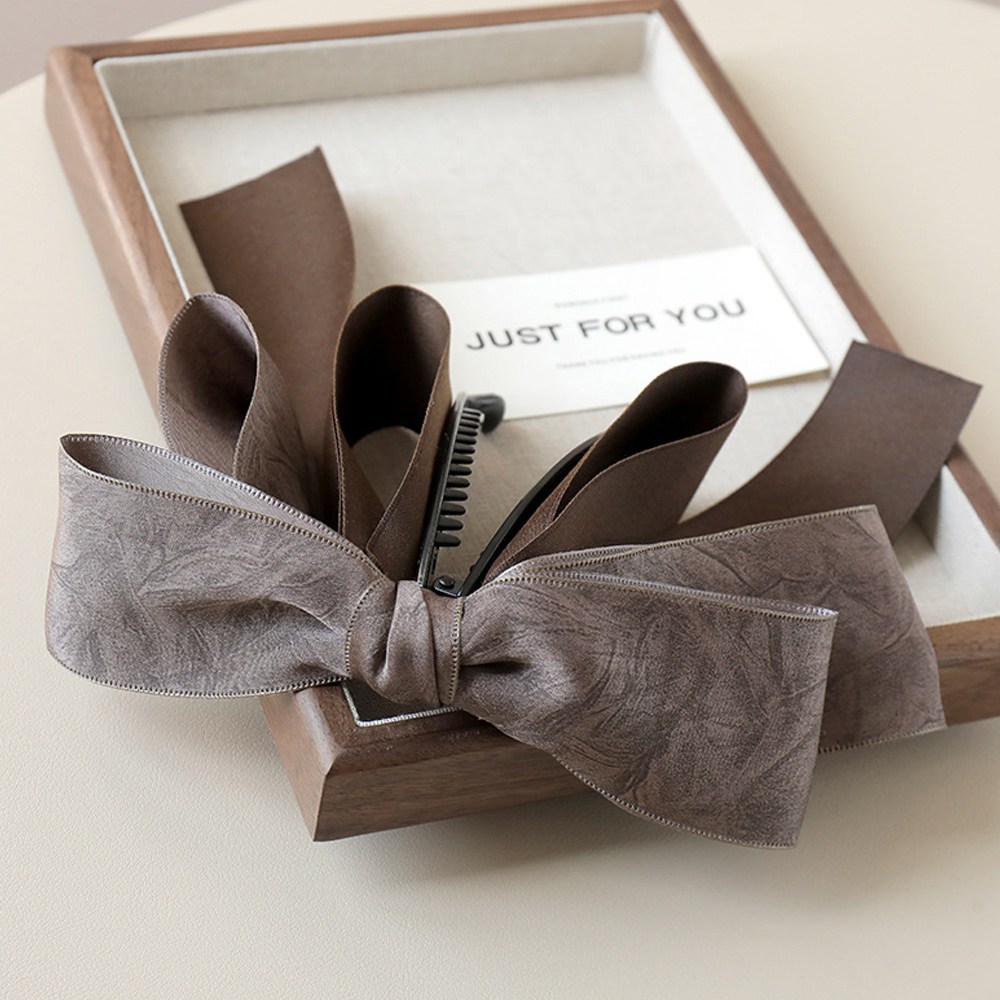 어반이즈 캘리 리본 여성 바나나핀 집게핀 10,800원