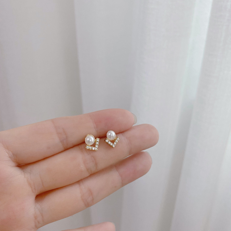 NXNA 14K 골드 V자 큐빅 진주귀걸이 여성패션 미니멀한 디자인 감미롭고 고급스러운 도금 리본귀걸이 CS-EH005 36,850원