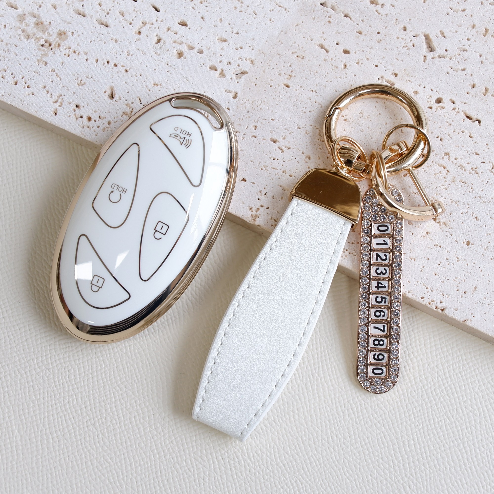 트니르 현대 호환 신형 5버튼 7버튼 디올 뉴 싼타페MX5 그랜저GN7 더뉴아반떼 쏘나타디엣지 더뉴투싼 코나 아이오닉 조약돌 차 키케이스 tpu 스트랩 16,900원