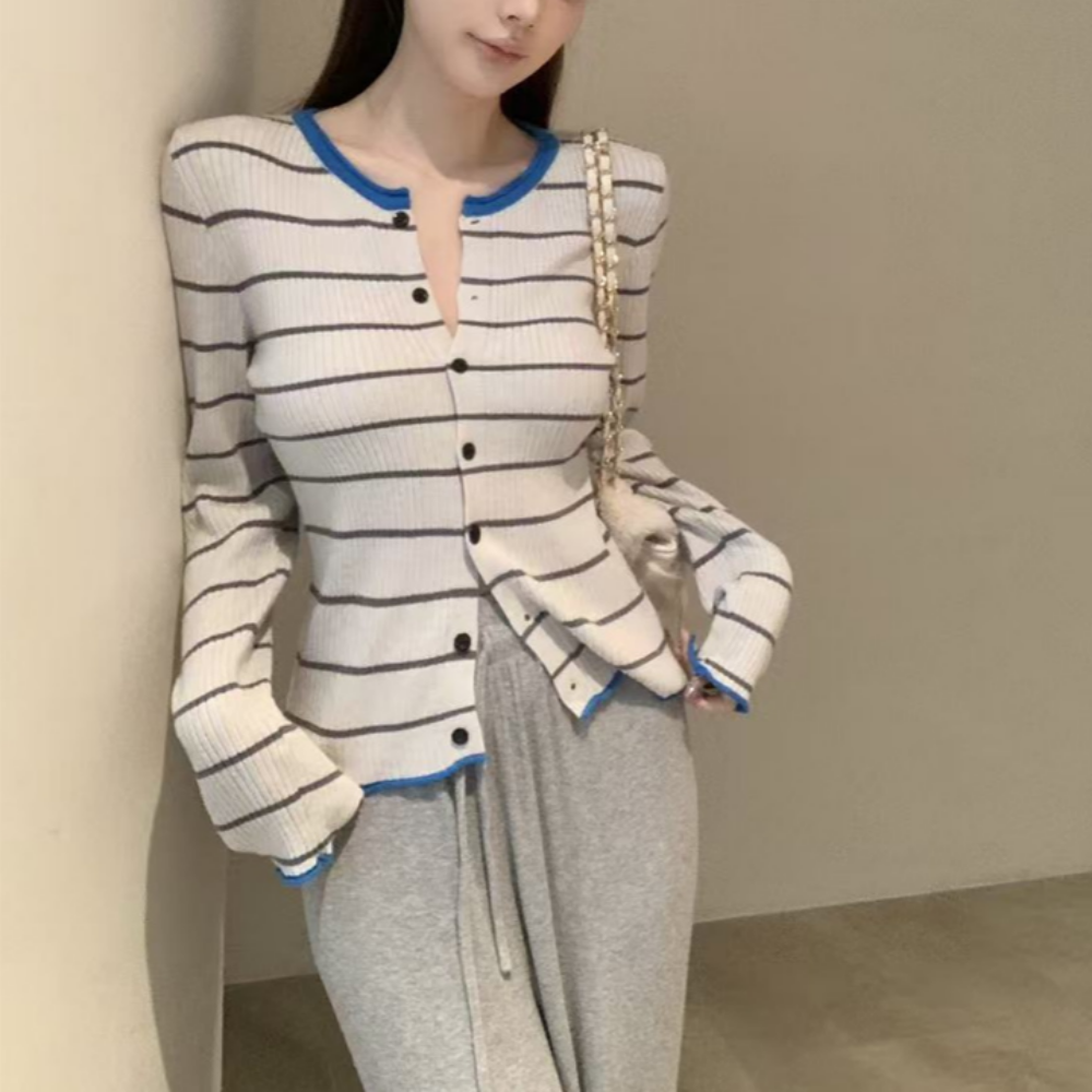 유니크코코 여성 스트라이프 간절기 봄 니트 가디건 5843 23,600원