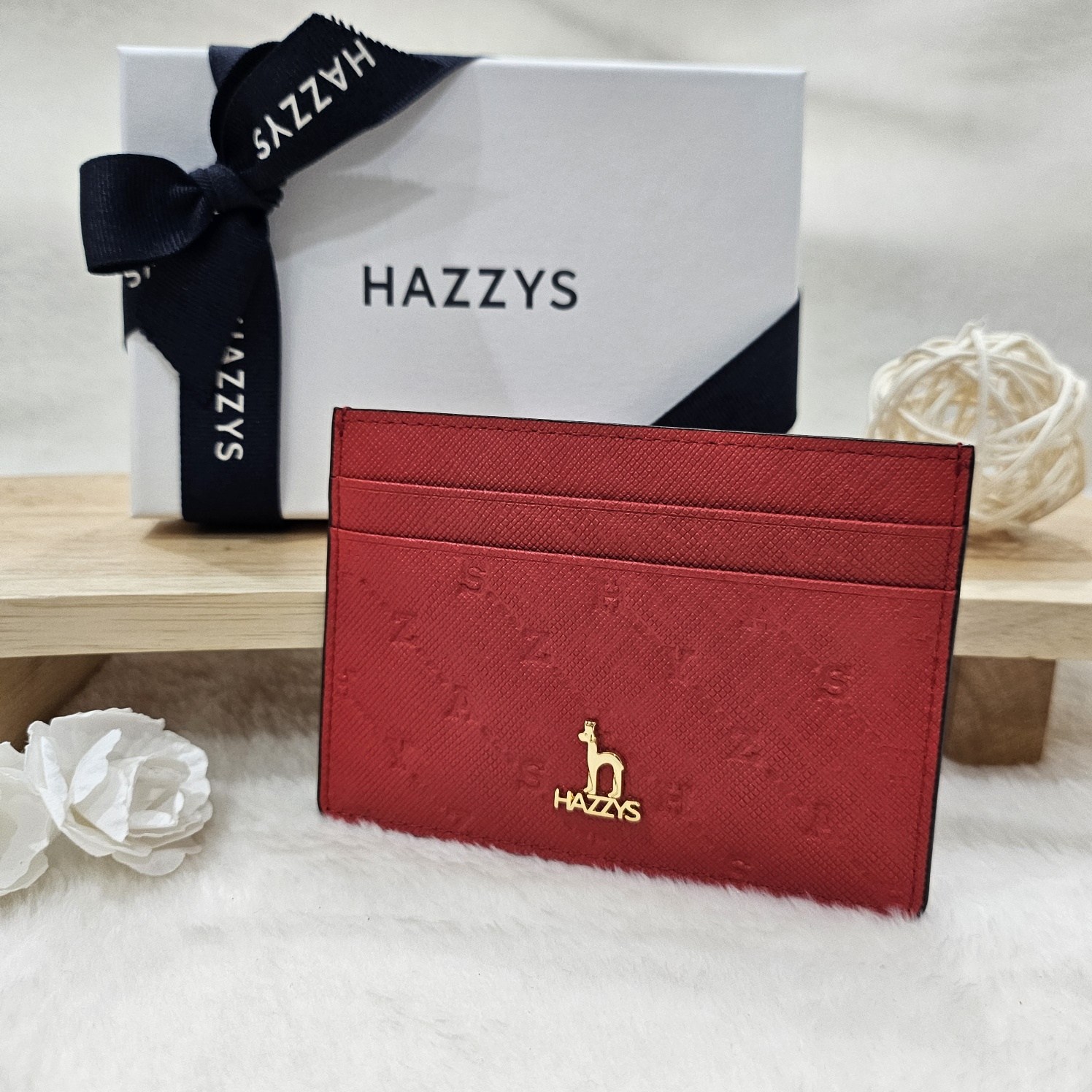 헤지스 퍼피로고 로고패턴 여성 카드지갑 50,800원