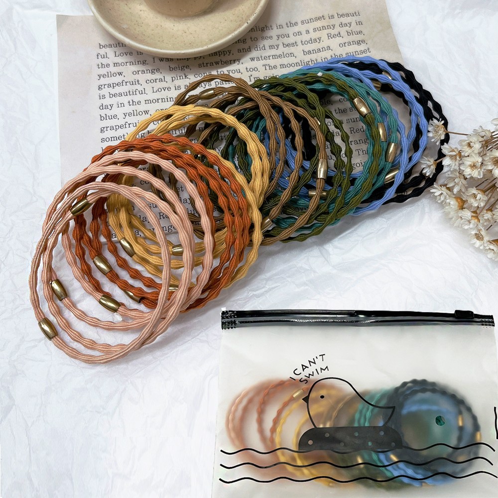 미다미 [32P파우치세트] 올록볼록 컬러풀 대용량 기본 머리끈세트 9,900원