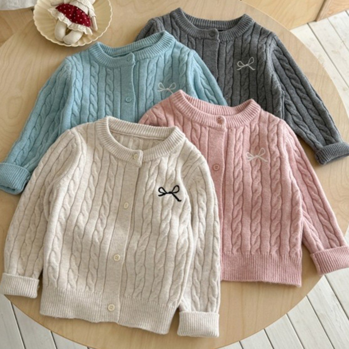 [더사랑이] 케이블 예쁜리본 가디건 키즈 아동복 유아 여아가디건 꽈베기가디건 니트가디건 23,900원