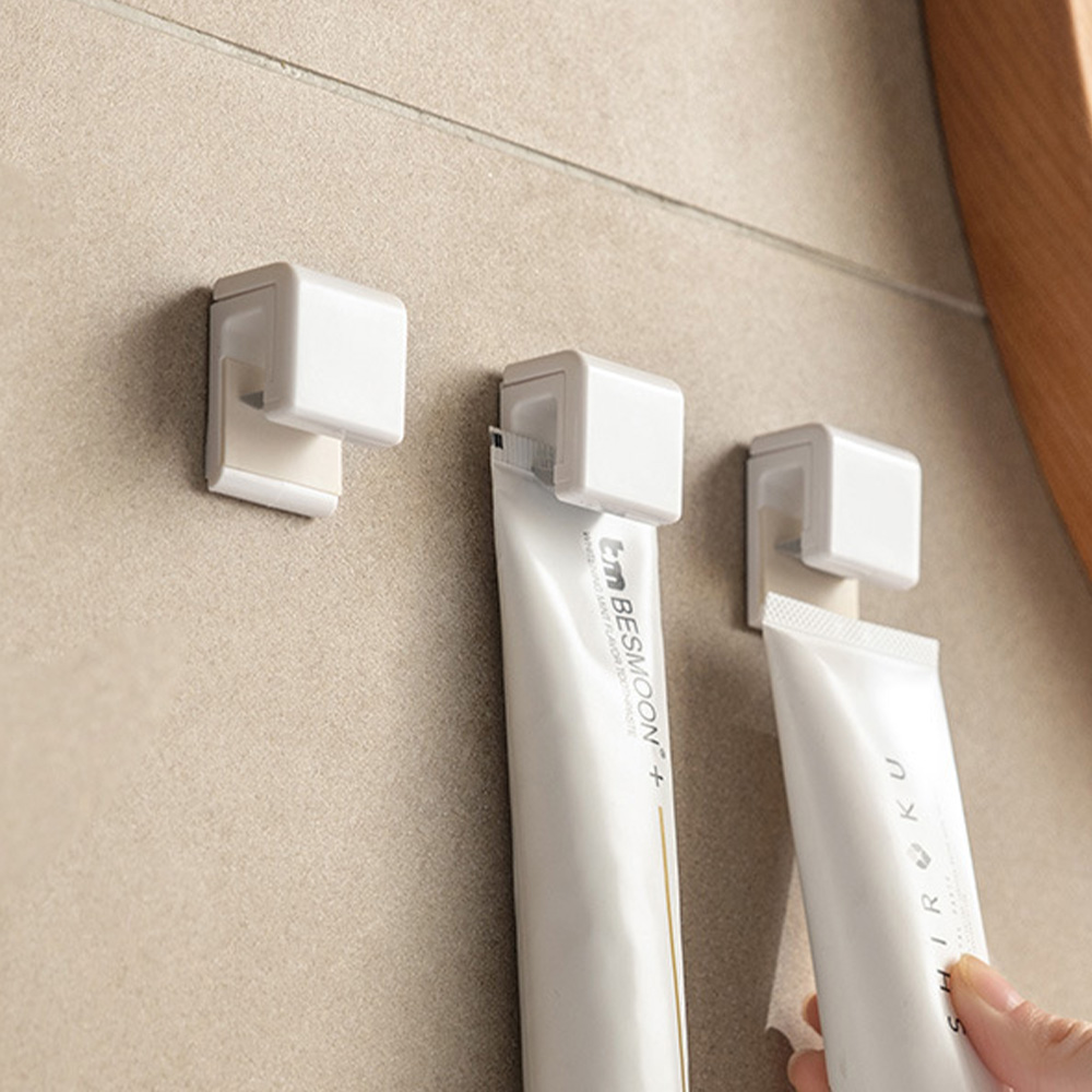 10개 무타공 접착식 치약 걸이 거치대 튜브링거 욕실 다용도 꽂이 홀더 부착식 8,900원