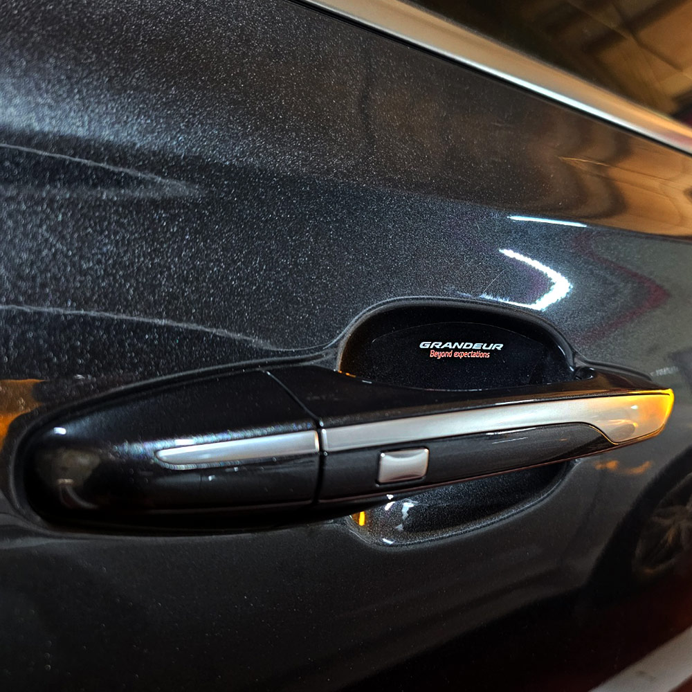 [비브랜드](와이앤유)UV 로고 레터링 포인트 인쇄 투명 도어컵 차손잡이 스티커 보호필름 그랜저HG 호환 7,000원