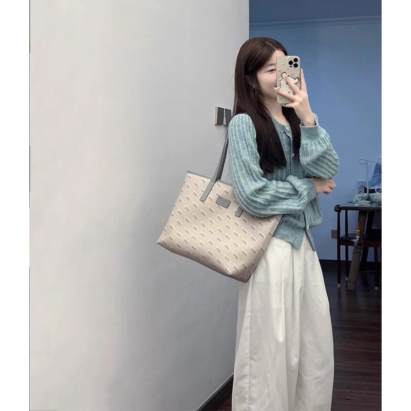 녕동 여성 니트 카디건 부드러운 봄가을 루즈핏 캐주얼 라운드넥 카디건 39,200원