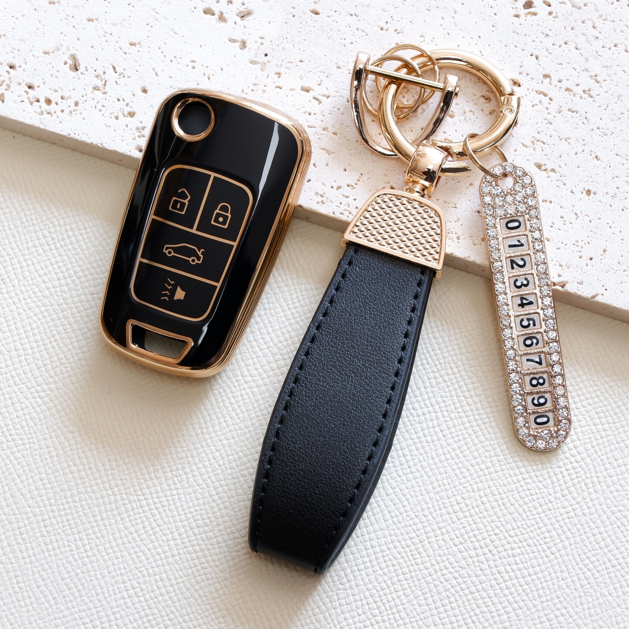 트니르 쉐보레 호환 아베오 트랙스 라세티프리미어 크루즈 올란도 말리부 알페온 순정 폴딩키 교체형 자동차 스마트 키 케이스 TPU 골드라인 번호판키링 스트랩 12,900원