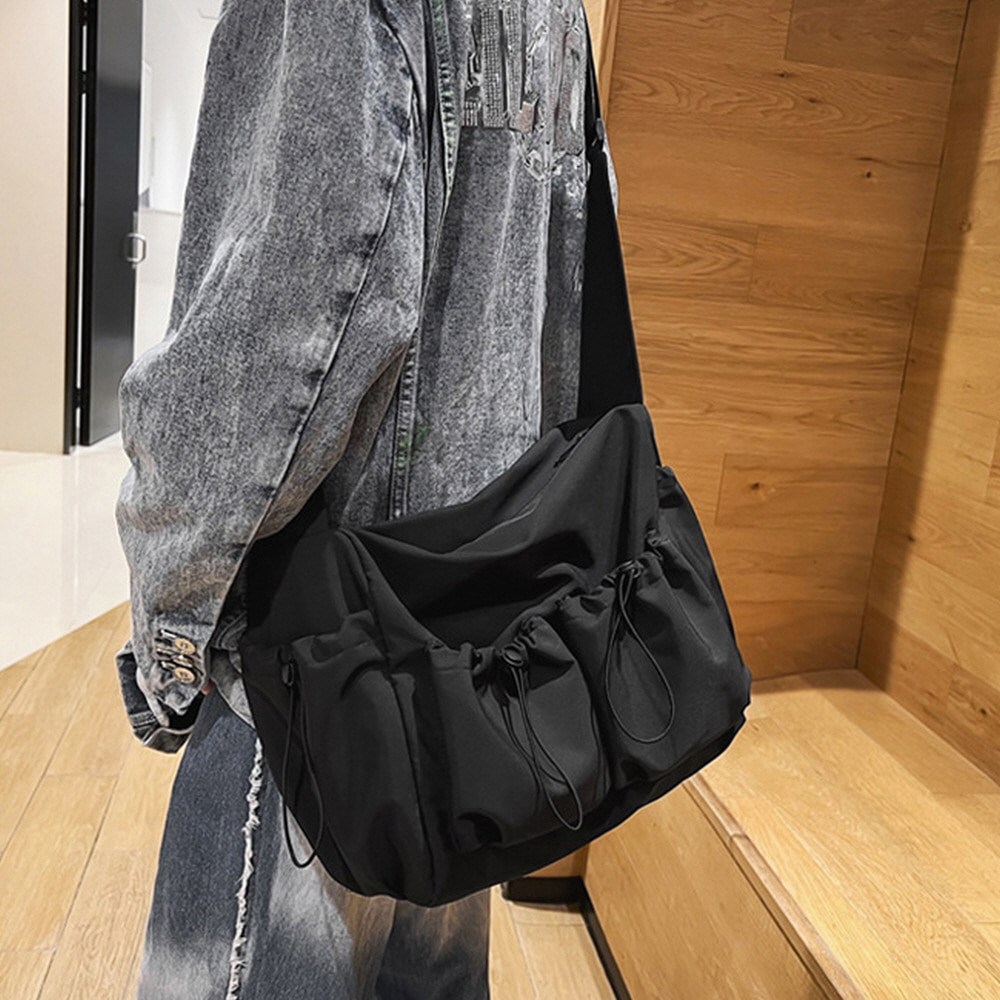 지디오 남녀공용 나일론 크로스백 대용량 학생 메신저백 멀티 포켓 스트링 숄더백 12,900원