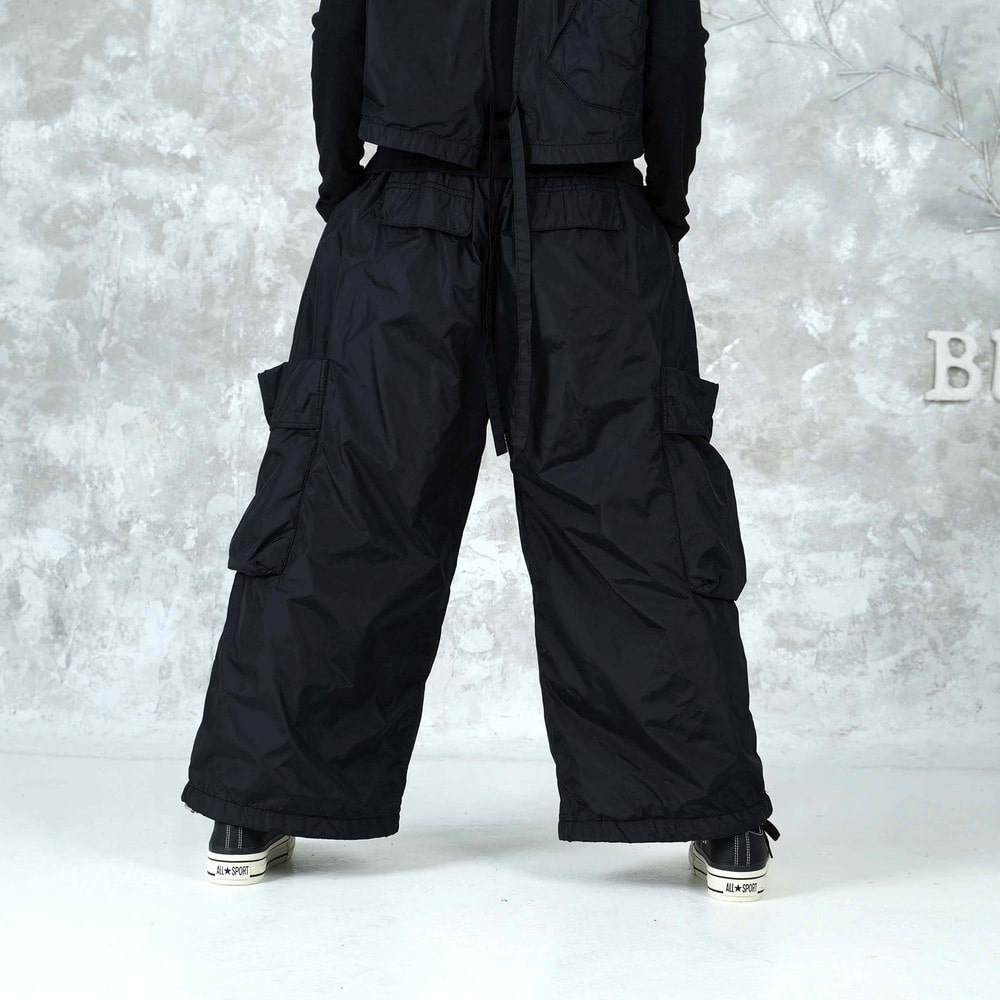 벅시루 여성 빅포켓 와이드 카고 스트링 합포 나일론 팬츠 93,200원