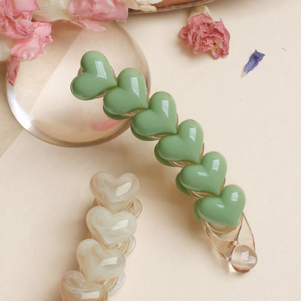 초콜리트쥬얼리 하트리나 7컬러 볼륨 통통 호마이카 하트 포니테일 헤어 집게 바나나핀 8,900원