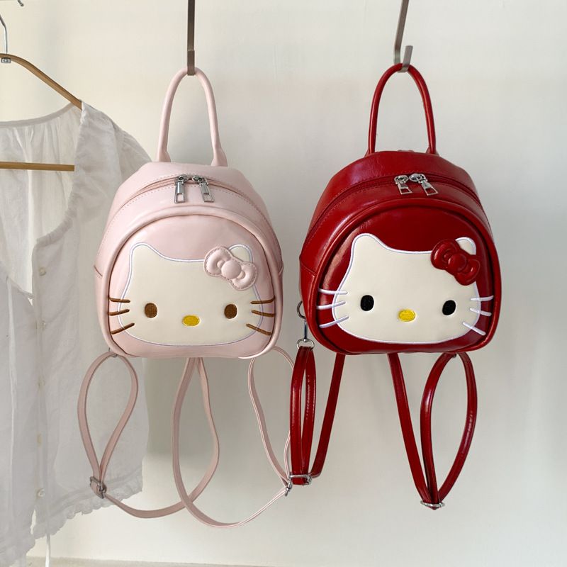 다나에 여성 귀여운 헬로키티 핑크 레드 가죽 방수 백팩 통근 가방+지아싱트레이드 머리끈 13,900원