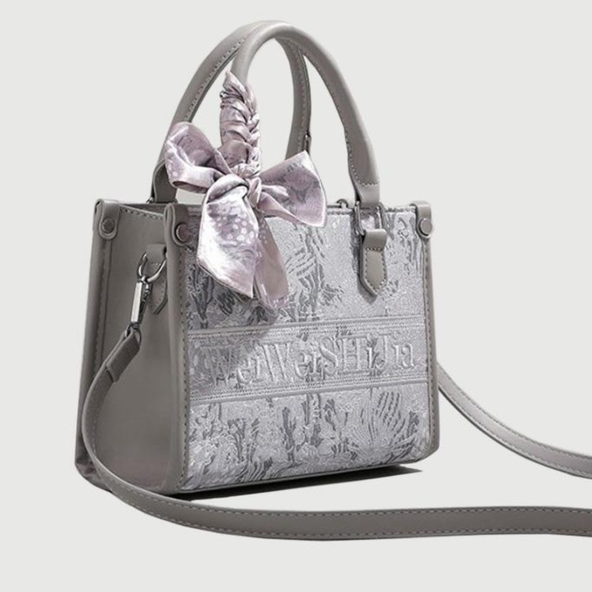 IELGY 출퇴근 여성 토트백, 하이엔드 패턴 자수 핸드헬드 원숄더 사선백 쇼핑백 (리본스타일 랜덤발송) 26,270원