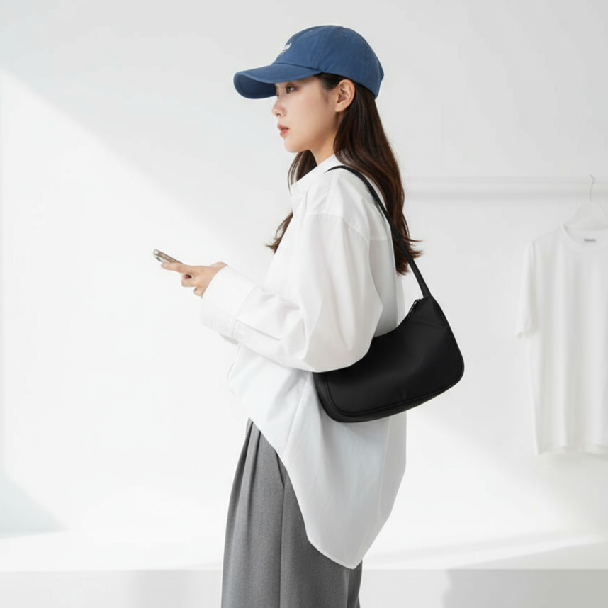 멜리플라이 나일론 반달 숄더백 16,920원