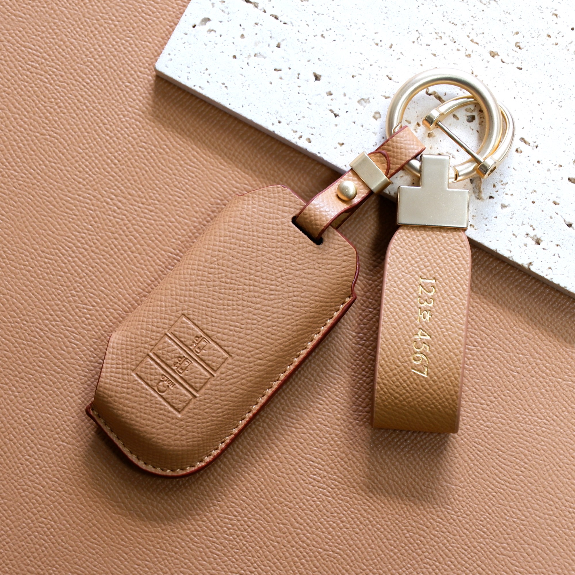 (무료각인)트니르 기아 호환 쏘렌토 MQ4 니로 스포티지 nq5 셀토스 카니발 k8 k7 k5 k3 EV6 모하비 더뉴 레이 차 키케이스 가죽 + 키링 차량용품 키홀더, 샌드브라운 23,900원