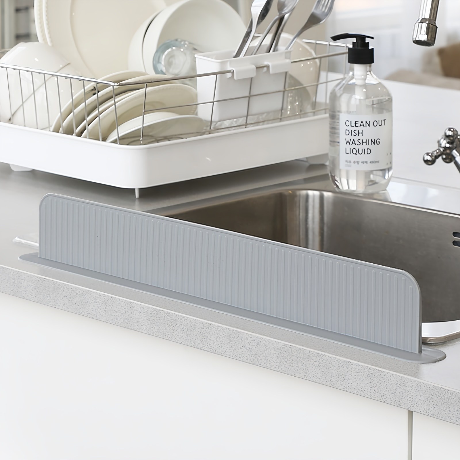 달팽이리빙 퀴진드마망 실리콘 씽크대 물막이 높이 7cm 8,900원