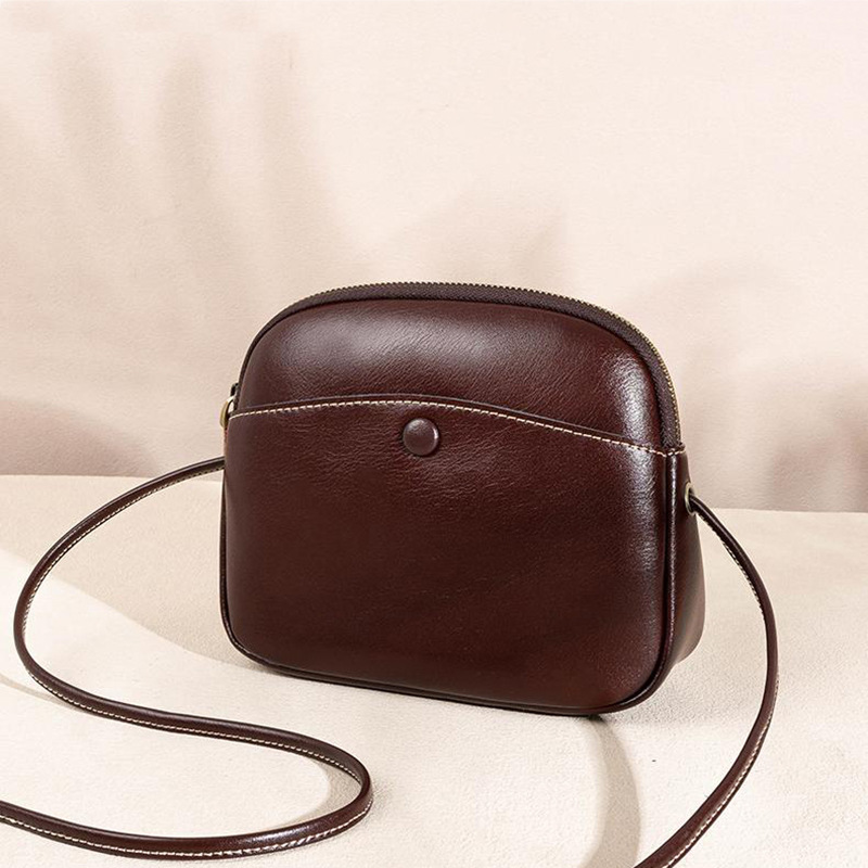 리치모리 천연 소가죽 콩단추 미니 크로스백 17,000원