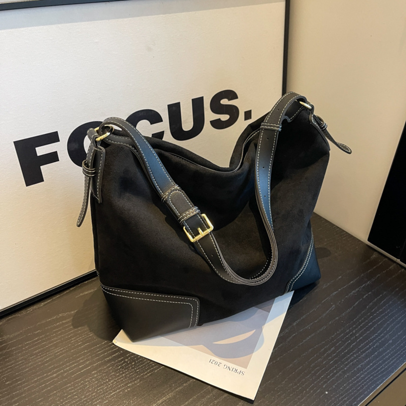 무니유유 트랜드 스웨이드 가죽 조합 끈조절 대용량 숄더백 24,800원