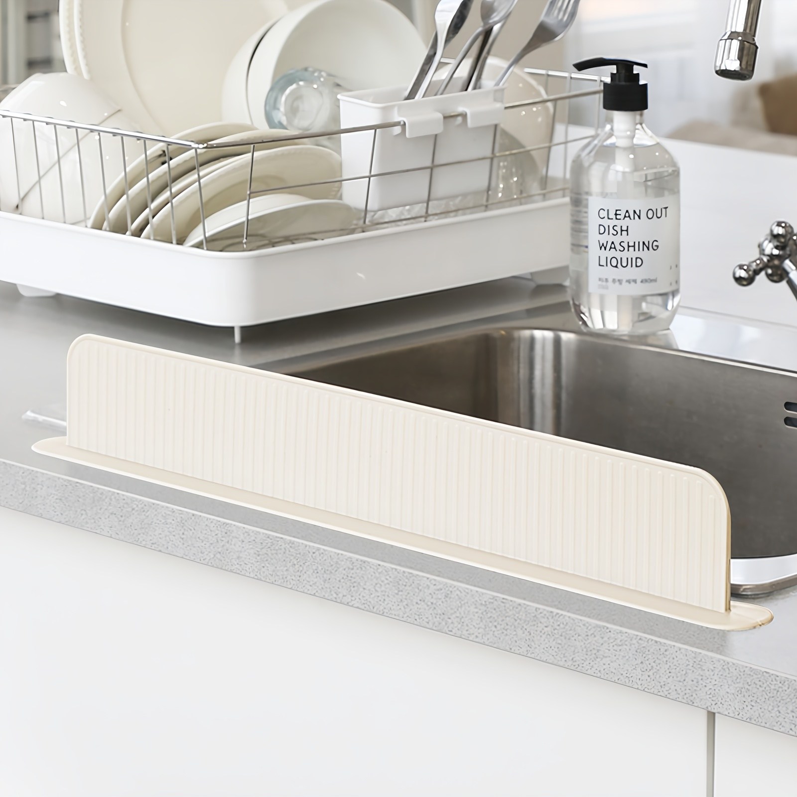 달팽이리빙 퀴진드마망 실리콘 씽크대 물막이 7H 8,900원