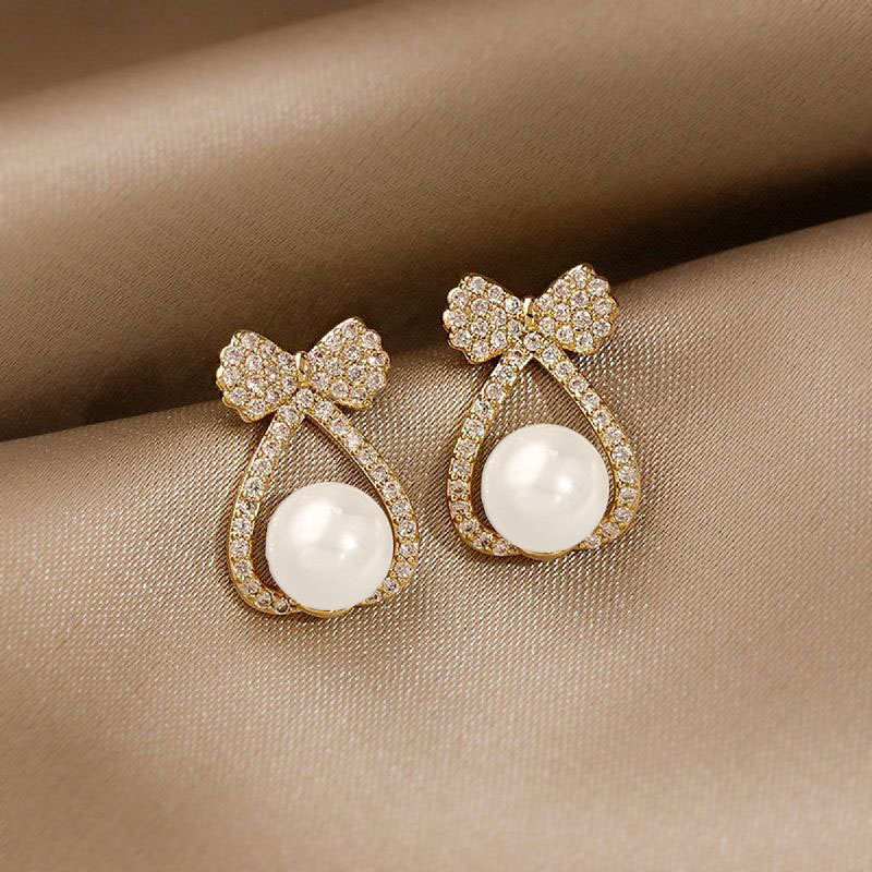 NXNA 14K 골드 진주 리본 귀걸이 여고급스러움 스타일링 이어링 도금 CS-EH019 36,190원