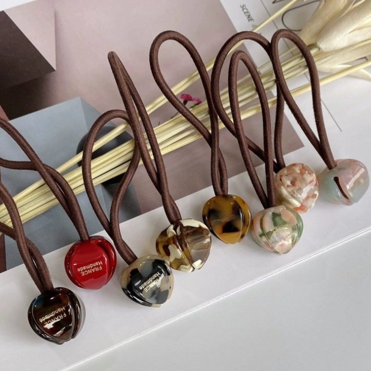 호피방울 프랑스핀 여성스러운 꽃모양 포니테일 여자 헤어 고무방울 호피 머리끈 2컬러 세트 8,720원