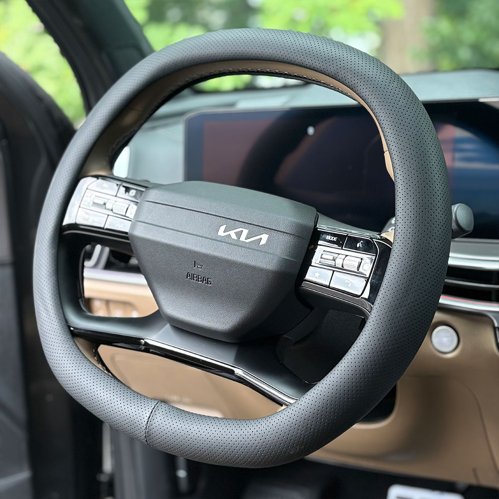 토레스 쏘렌토 액티언 카니발 타스만 EV5 신형 가죽 더블D컷 타공 핸들커버 23,370원