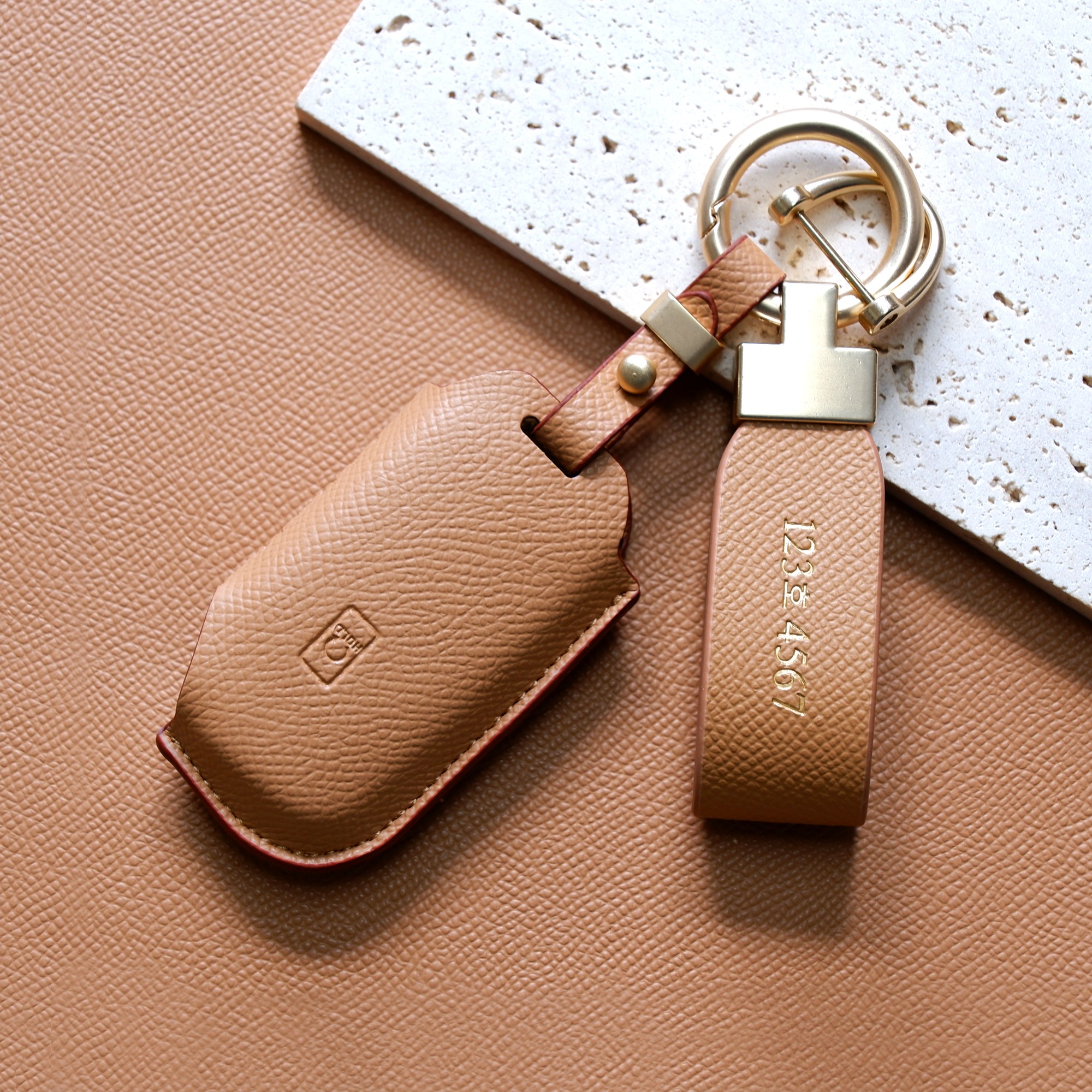 (무료각인)트니르 기아 호환 쏘렌토 MQ4 니로 스포티지 nq5 셀토스 카니발 k8 k7 k5 k3 EV6 모하비 더뉴 레이 차 키케이스 가죽 + 키링 차량용품 키홀더, 샌드브라운 23,900원