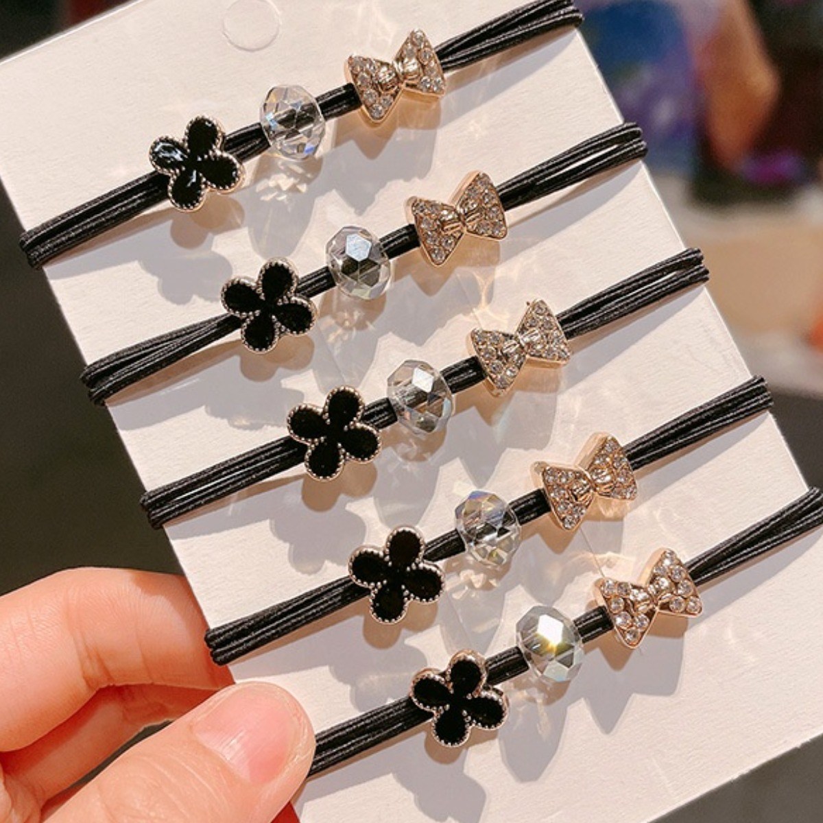 [10개1세트] 보리보리 여성 예쁜 큐빅 클로버 리본 머리끈 9,900원