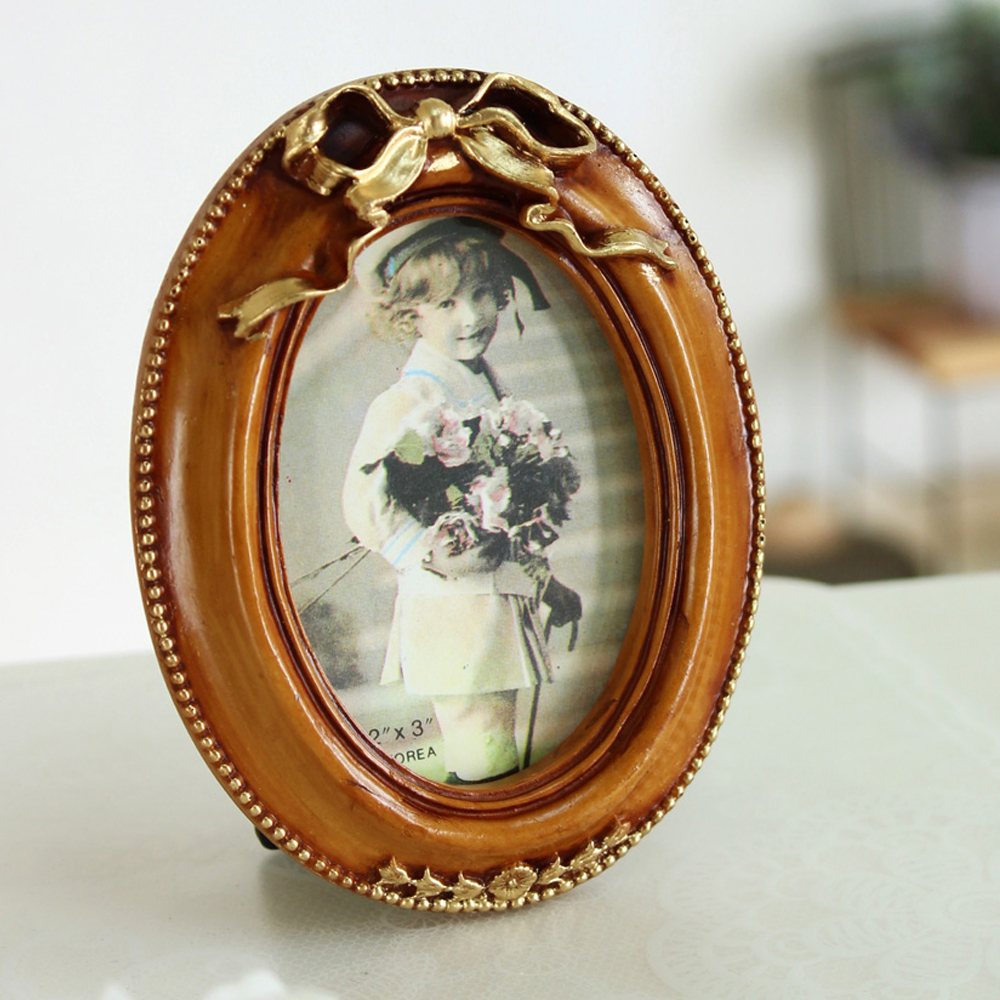 키다리 뉴리본 타원 액자, 혼합색상, 1개 14,360원