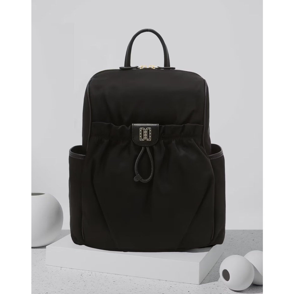 닥스 DCBA6E334BK HILTON 블랙 앤틱 DD장식 나일론 백팩 MOU272 COF223 300,900원