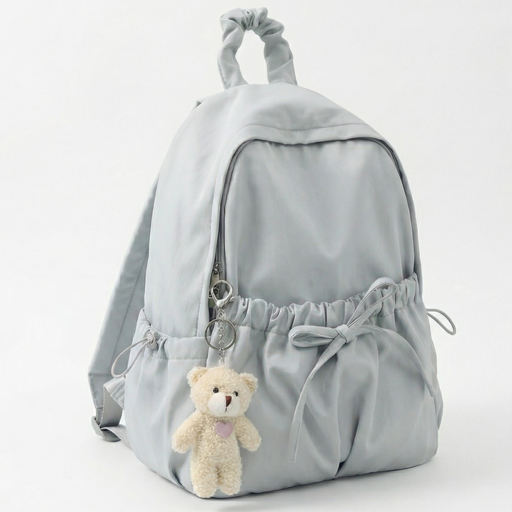 닷옴 여성 나일론 리본 셔링 포켓 백팩 곰인형 키링 가벼운 가방 39,800원