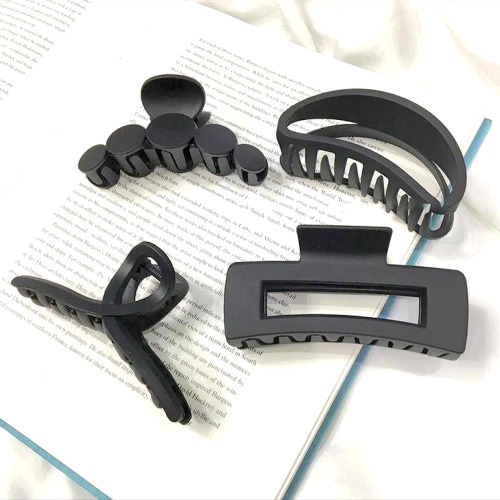 TINY 검정 집게 머리핀 4개 1세트 8,460원