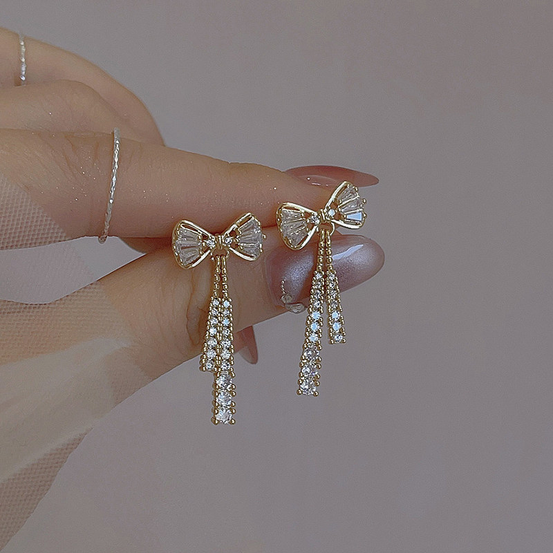 NXNA 14K 골드 리본 큐빅 귀걸이 세팅 크리스털 스타일리쉬한 디자인 도금 귀걸이 여성 CS-ED050 49,280원
