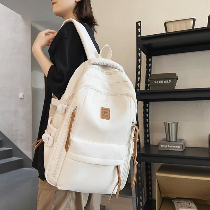 투니스 남녀 공용 심플 대용량 백팩 12,850원