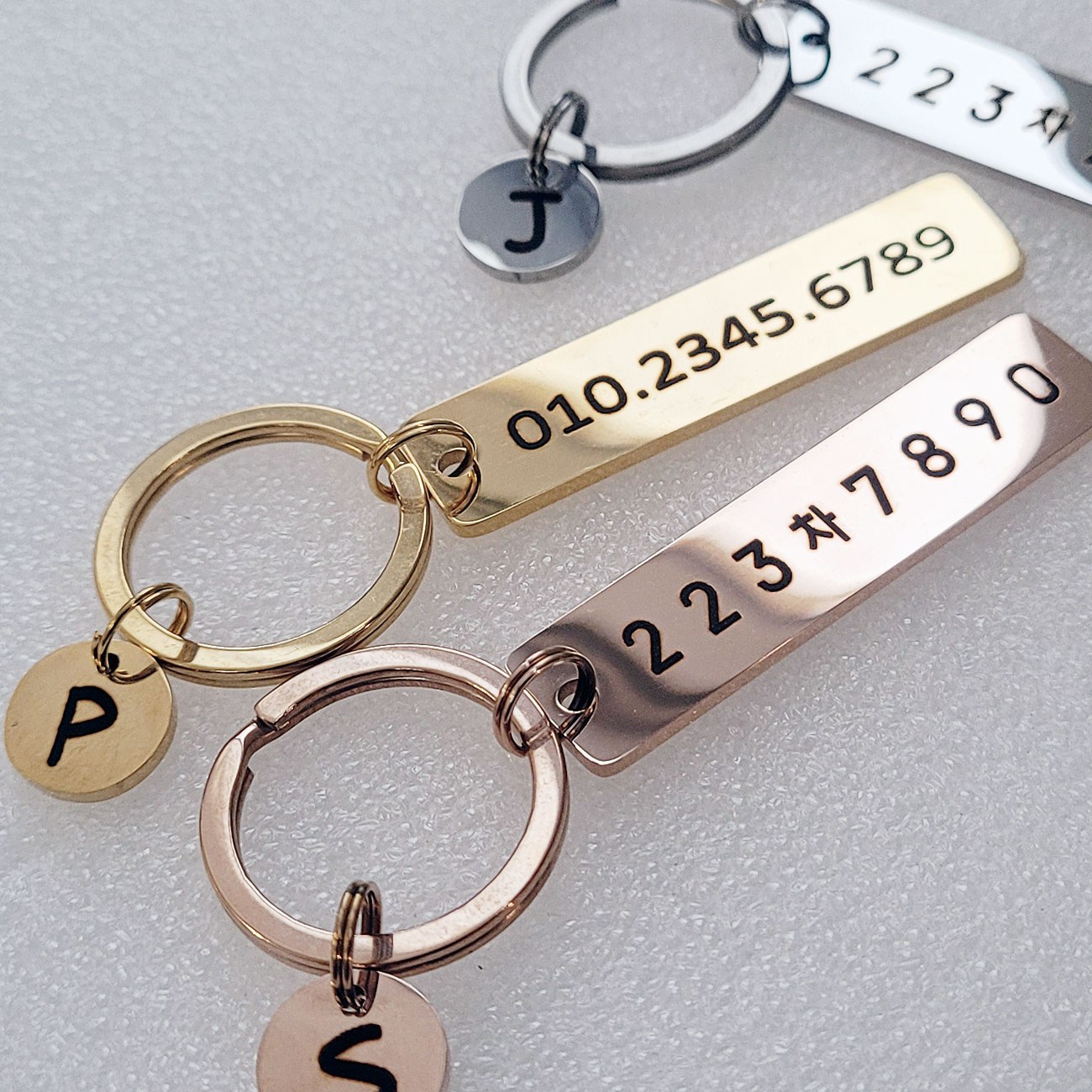 자동차 번호판 키링 열쇠고리 메탈미러 스테인레스 E타입 레이저각인 주차번호 12,200원